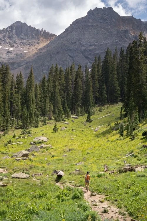 Vendette Peak, nearby activity: Hiker overlooking a Colorado mountain lake, luxury vacation rental in Silverthorne, Colorado